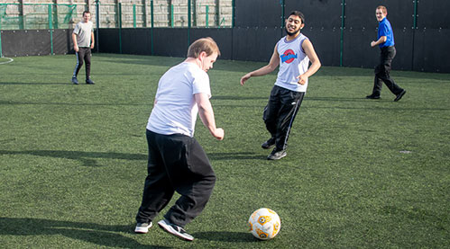 Playing football at Y Sifil