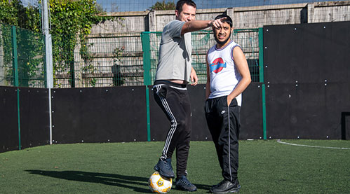 Playing football at Y Sifil